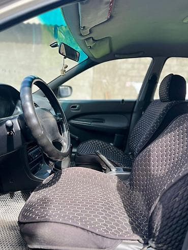 купить гоночную машину: Mazda Familia: 1996 г., Механика, Бензин, Седан — 5