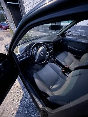 k5 2016: Chevrolet Nexia: 2011 г., 1.6 л, Седан — 7