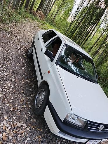 mers 814: Volkswagen Vento: 1992 г., Механика, Седан — 2