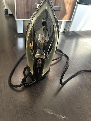 apple magic: Утюг Philips, Паровой, Вертикальное отпаривание — 1