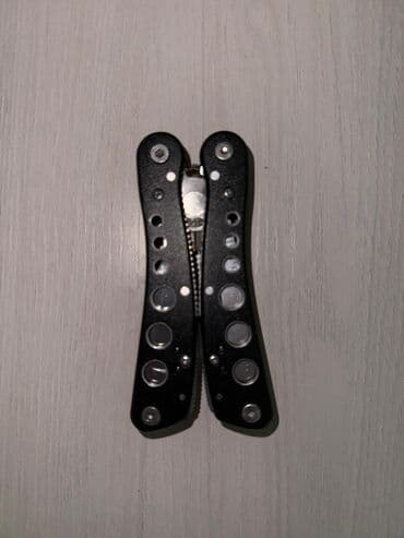 Музыкальные инструменты: Мультитулы и швейцарские ножи (набор) 1) Красный швейцарский нож — 11