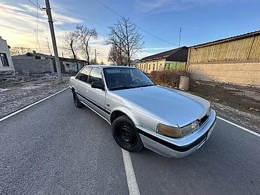 124 e500: Mazda 626: 1993 г., Седан — 5