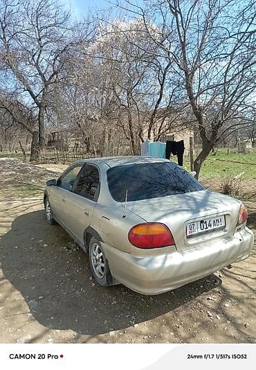 step 2: Kia Sephia: 1995 г., 1.6 л, Механика, Бензин, Седан — 4