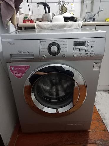 Отопительные приборы: Стиральная машина LG с фронтальной загрузкой, серый цвет. Технология — 1