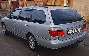 lada priors: Nissan Primera: 2000 г., 1.8 л, Механика, Бензин, Универсал — 7