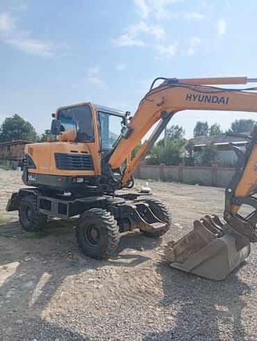 органайзеры для авто: Экскаватор, Hyundai, 2013 г., Колесный — 9