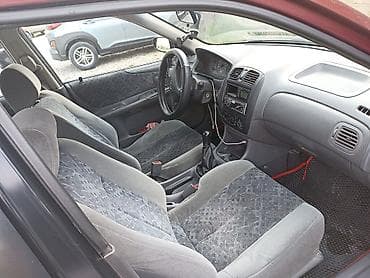 launch pro elite: Mazda Protege: 1998 г., 1.6 л, Механика, Бензин, Хэтчбэк — 7
