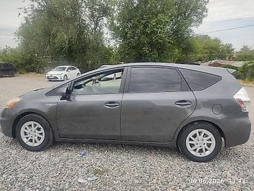 от приуса: Toyota Prius V: 2013 г., 1.8 л, Автомат, Гибрид, Универсал — 4