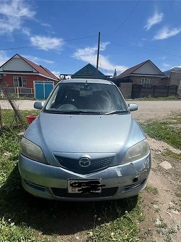 авто чихол: Mazda Demio: 2004 г., Автомат, Бензин, Хэтчбэк — 6