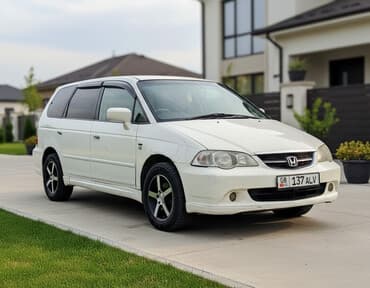 дом на колесах купить бу: Honda Odyssey: 2002 г., 2.3 л, Типтроник, Бензиновая, Универсал — 1