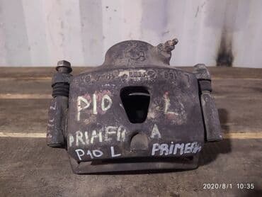 Nissan Primera Р 10 Суппорт тормозной, Ниссан Примера П 10 супорт