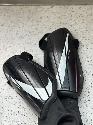 Футбольные щитки Nike Charge Оригинал - Модель: Nike Charge (надпись