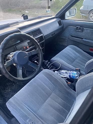 кел кел: Nissan Bluebird: 1990 г., 2 л, Кол менен иштөөчү, Дизель, Универсал — 4