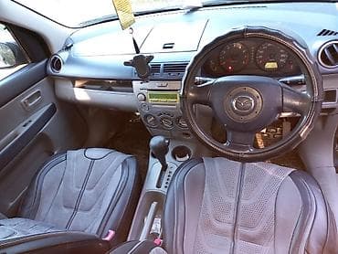 bcd com: Mazda Demio: 2003 г., 1.3 л, Автомат, Бензин, Универсал — 9