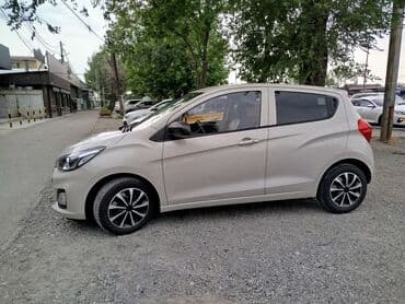 машина салон: Автомобиль Chevrolet Spark в бежевом цвете, представленный в кузове — 2