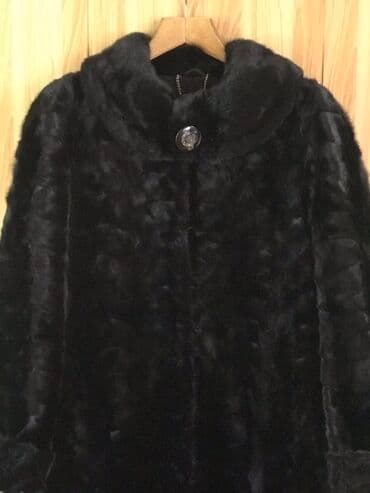 срочно продаю в связи с переездом: Продаю новую норковую длинную шубу. Цвет меха чёрный — 4
