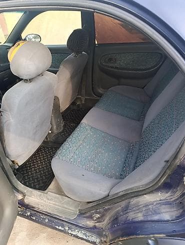 шагыл сокулук: Kia Shuma: 1999 г., 1.5 л, Кол менен иштөөчү, Газ, Седан — 5