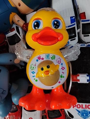 музыка ветра: Музыкальная интерактивная игрушка «Уточка» YJ TOYS - Яркая — 1