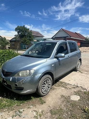 авто чихол: Mazda Demio: 2004 г., Автомат, Бензин, Хэтчбэк — 4