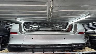 x5 e70: Бампер Kia — 1