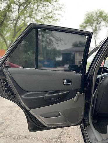 sky way: Mazda 323: 2002 г., 1.3 л, Механика, Бензин, Универсал — 6