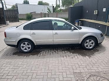 Volkswagen: Volkswagen Passat: 1999 г., Седан — 4