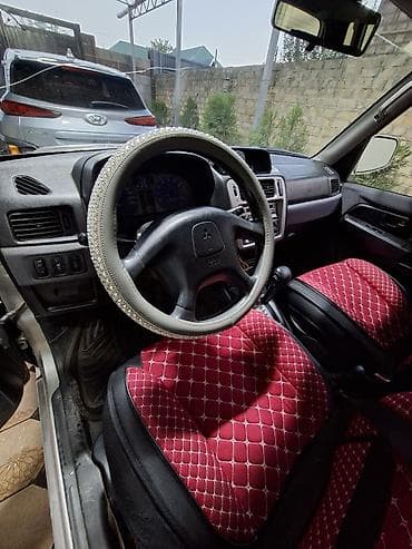 горный: Mitsubishi Pajero iO: 2001 г., 2 л, Автомат, Бензин, Внедорожник — 8