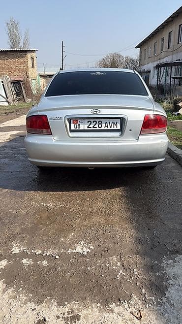 Башкалар: Седан серебристого цвета. Основные особенности: - Кузов: 4-дверный — 8