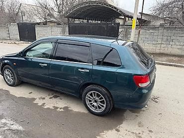 я ищу степ вагон: Просторный универсал темно-зелёного цвета с тонированными стёклами — 4