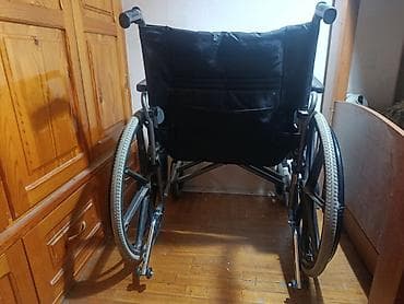 Медицинская мебель: Инвалидная коляска складная, ручной привод. Особенности: - Стальной — 2