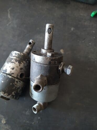 Кран управления подьёмом кузова МАЗ