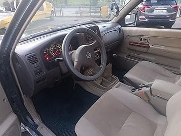 простой: Nissan Navara: 2015 г., 2.5 л, Механика, Бензин, Пикап — 8