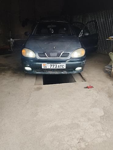 Daewoo Lanos: 1999 г., 1.5 л, Механика, Бензин, Седан
