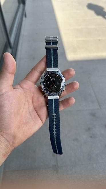 Garmin: Смарт-часы Garmin (серия MARQ/подобная) с синим безелем и тканевым — 1
