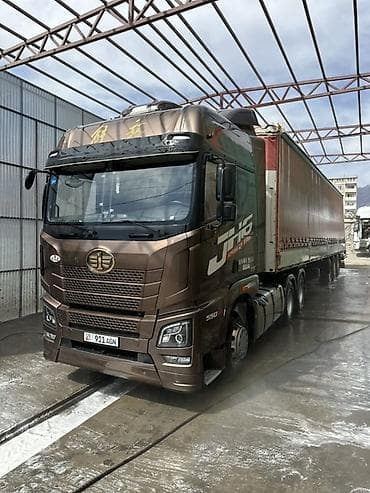 bmw 225: Тягач, Howo, Тентованный — 1