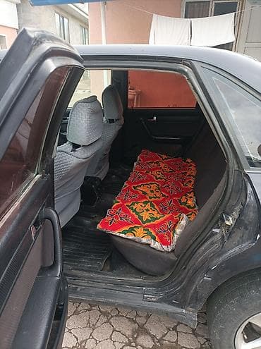 аудио касета: Audi 100: 1991 г., 2 л, Механика, Бензин, Седан — 8