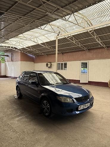 сокулук арал: Mazda 323: 2001 г., 1.6 л, Кол менен иштөөчү, Бензин, Хетчбек — 5