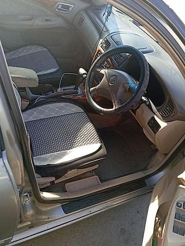 1 тонна: Nissan Bluebird: 2003 г., Автомат, Бензин, Седан — 2