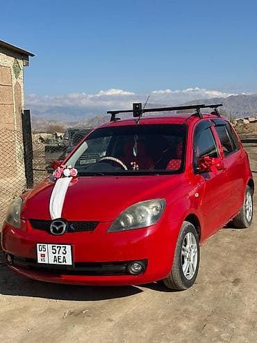 обмен на квартира: Mazda Demio: 2004 г., 1.3 л, Автомат, Бензин, Хэтчбэк — 3