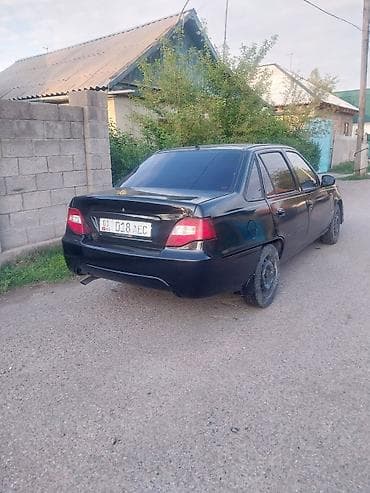 kia mording: Черный седан (номер KG 018 AEC), тюнингованный внешний вид. Основные — 1