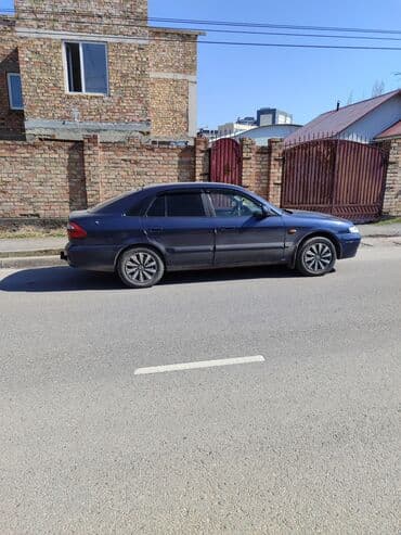 Mazda 626: 2001 г., 1.8 л, Механика, Бензиновая, Хэтчбэк