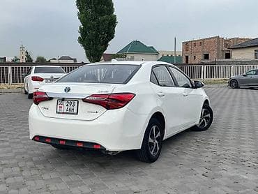 byd e2 2023: Toyota Corolla: 2018 г., Вариатор, Гибрид, Седан — 3