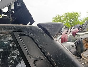 установка люка на авто: Задний спойлер Ssangyong — 3