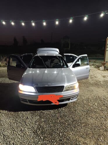 Nissan : 1995 г., 2 л, Механика, Бензин, Седан