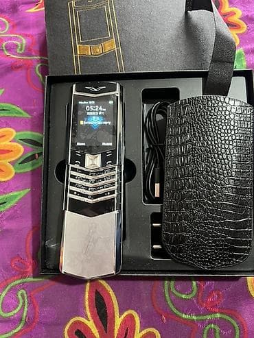 nokia 6303ci: Vertu Aster, Новый, цвет - Серебристый, 2 SIM — 2
