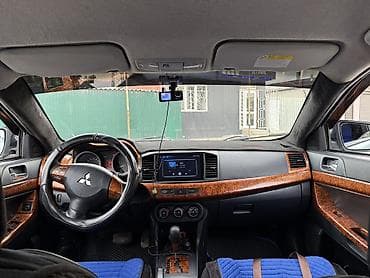 450000: Mitsubishi Lancer: 2012 г., 1.6 л, Автомат, Газ, Седан — 8