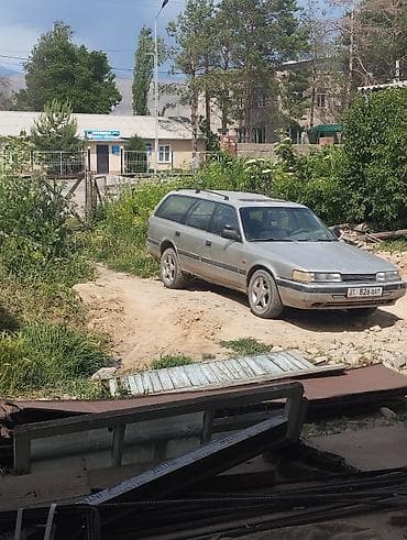 su 7: Mazda 626: 1989 г., 2 л, Механика, Газ, Универсал — 1