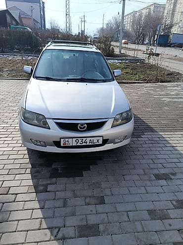 65 style: Mazda Protege: 2003 г., 2 л, Механика, Бензин, Универсал — 3
