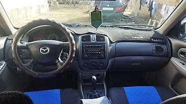 Mazda: Mazda Familia: 2002 г., 1.6 л, Механика, Бензин, Универсал — 10