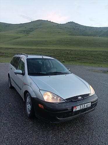 боковой тырмоо: Ford Focus: 2002 г., 1.8 л, Механика, Бензин, Универсал — 7